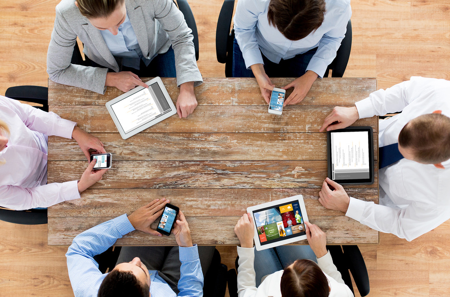 Business Team with Smartphones and Tablet Pc