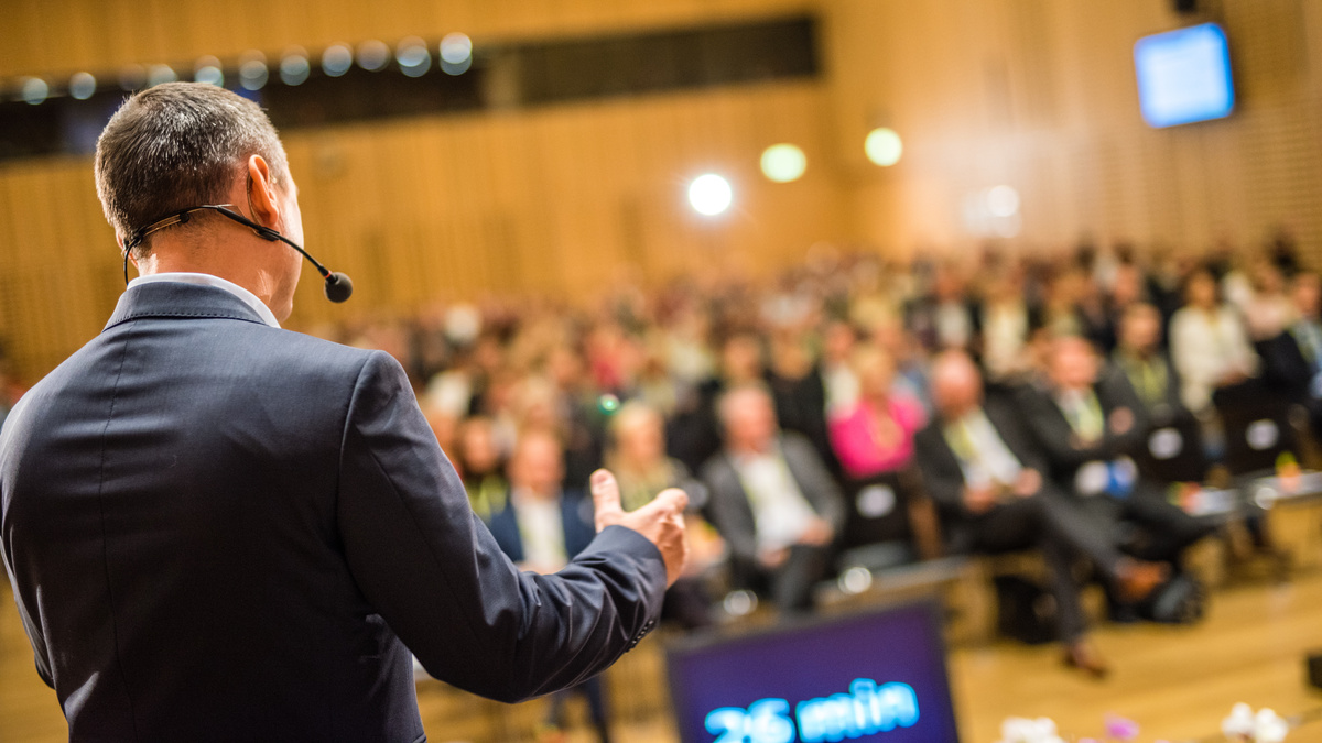 Business people in seminar at auditorium